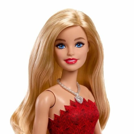 Niña jugando con bloques apilables Barbie, fomentando motricidad fina