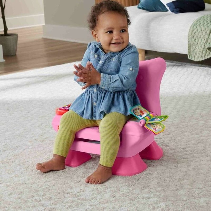 Juguete construcción motricidad fina: Detalles de botones y actividades en silla Fisher-Price