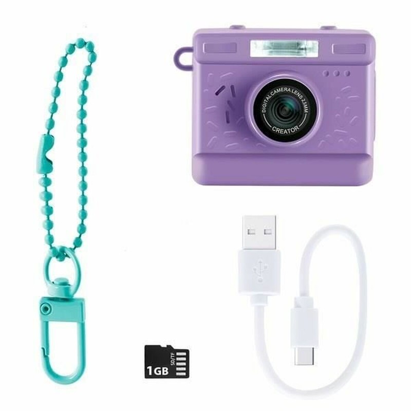 Niña fotografiando su juguete construcción motricidad fina con la Mini Cam