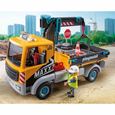 Figura de trabajador Playmobil incluida en el set 71750, lista para la obra.