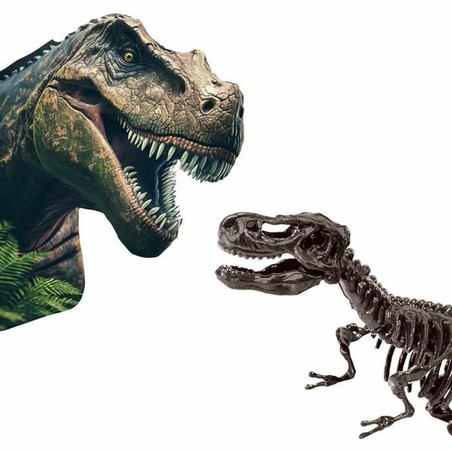 Niño jugando con juego de excavación de dinosaurios