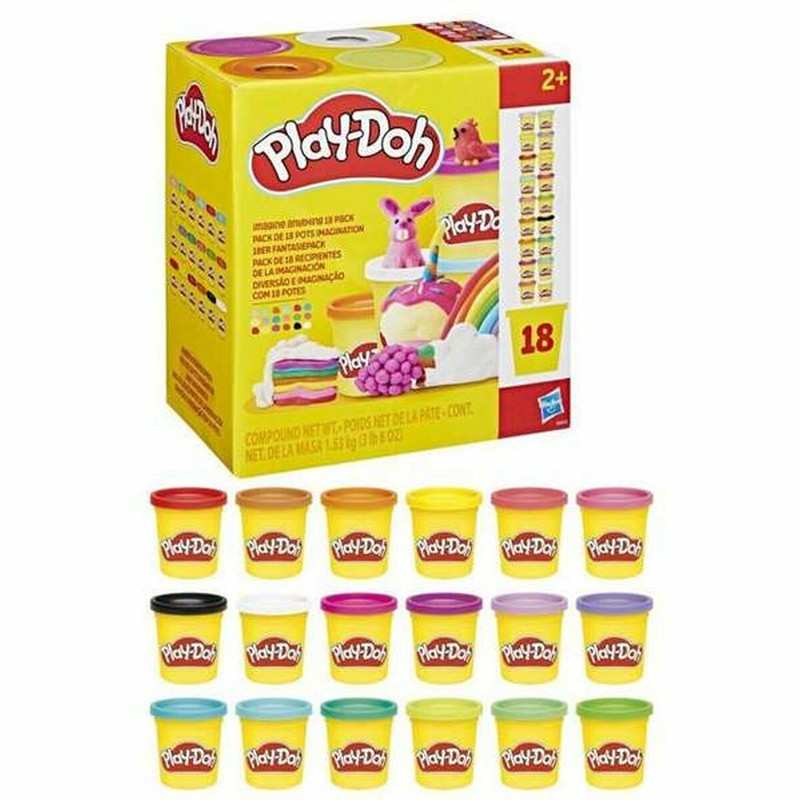 Manos de niño jugando con plastilina Play-Doh Hasbro