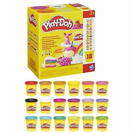 Manos de niño jugando con plastilina Play-Doh Hasbro