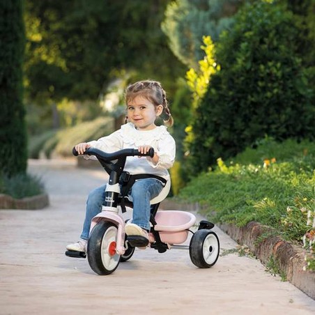 Triciclo Smoby desmontado para fácil montaje