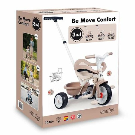 Primer triciclo desarrollo motor Smoby en un parque, con un niño disfrutando del paseo.