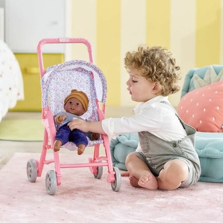 Niña jugando con Carrito Muñecas Corolle, un set construcción educativo de roles