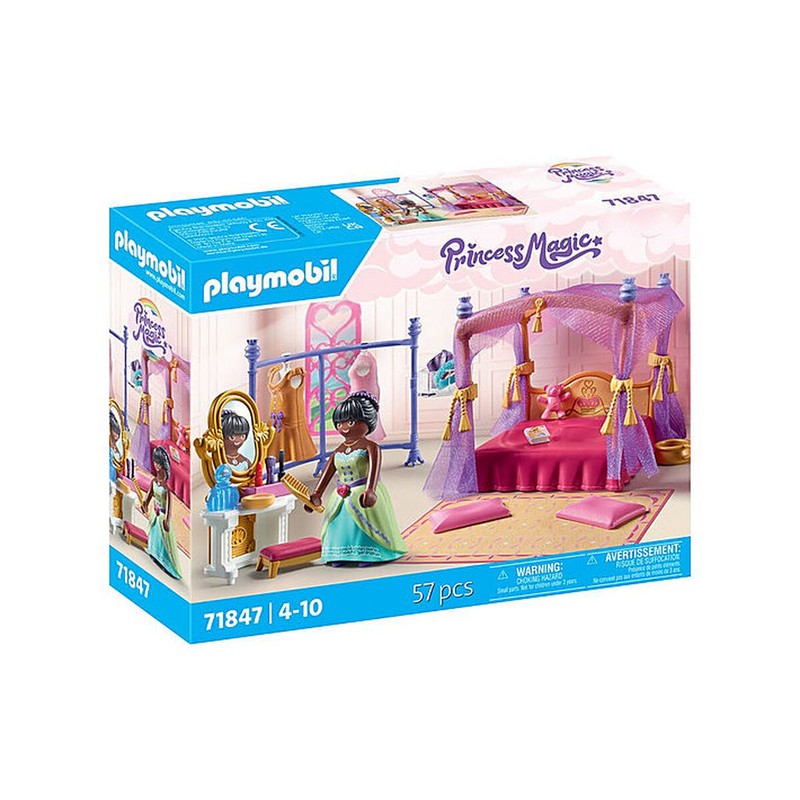 Niño jugando con juguetes de construcción Playmobil