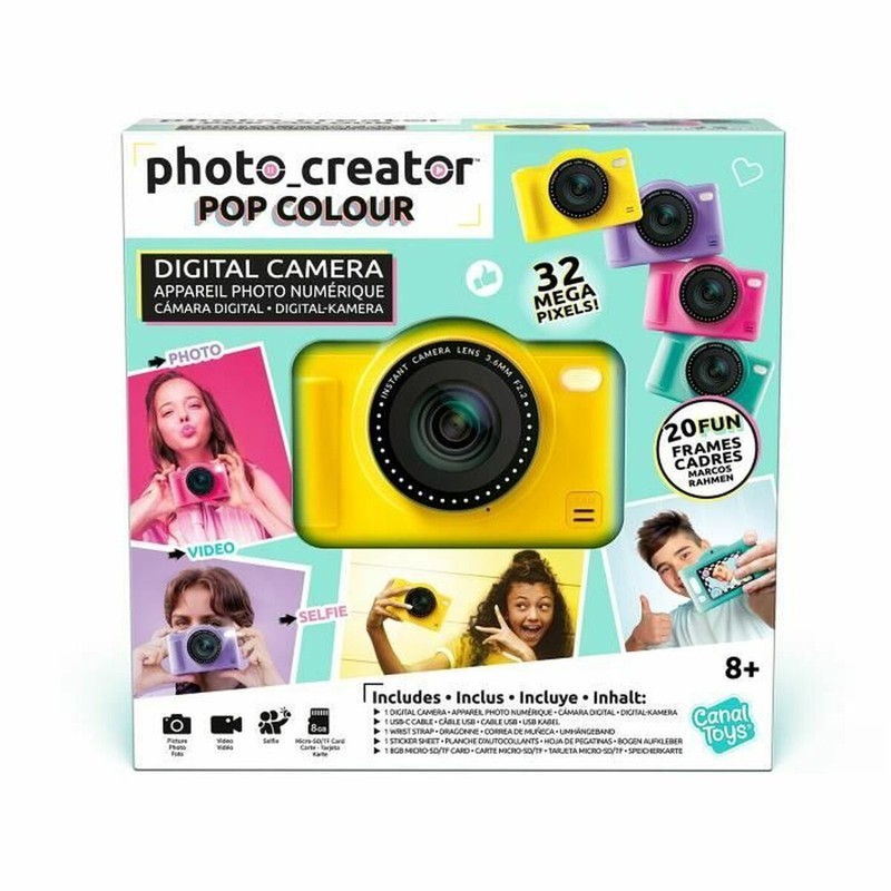 Niño usando cámara de fotos para aprender fotografía