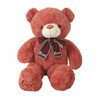Oso de Peluche Grande de 75 cm con lazo, sonriendo.