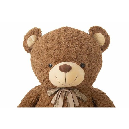 Peluche suave bebé Co-Co abrazando niño