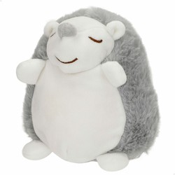 Peluche musical bebé erizo con luz encendida en la oscuridad
