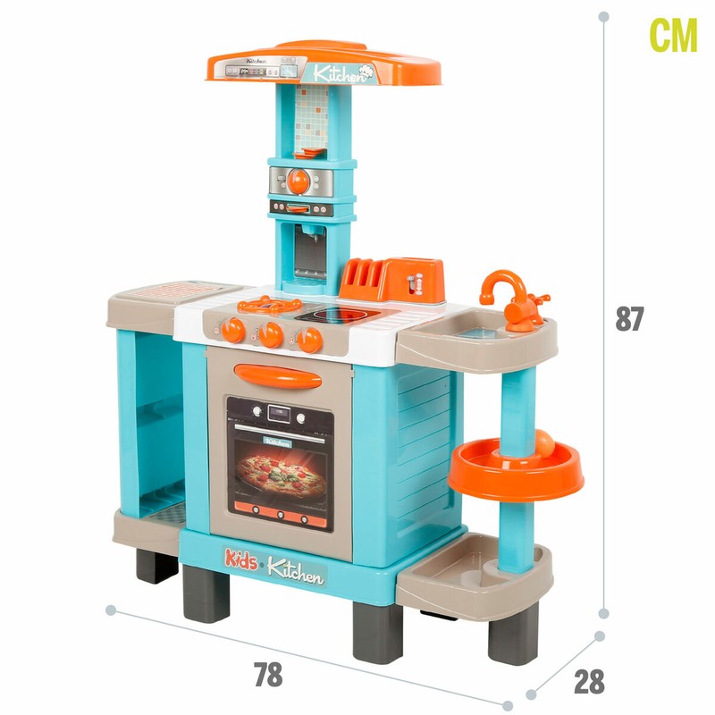 Juego de Roles Cocina: niño jugando con la tostadora.