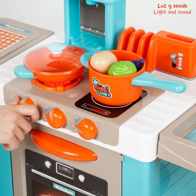 Set de cocina completo para niños, con alimentos de juguete.