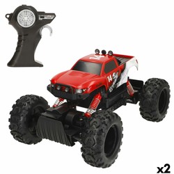 Coche radiocontrol todo terreno Maisto Rock Crawler rojo en acción.
