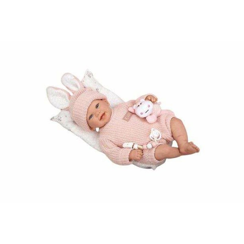 Muñeca reborn realista de Arias, Lucía, con vestido rosa y cojín