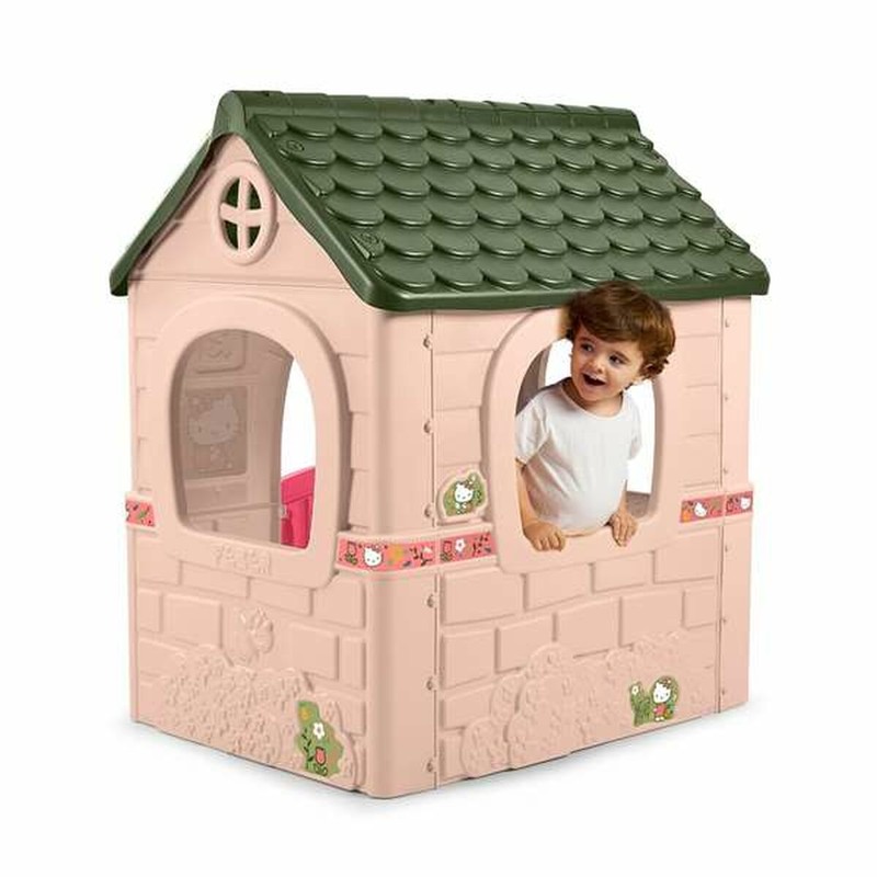 Casita Hello Kitty de color rosa, detalle de puerta y ventanas.