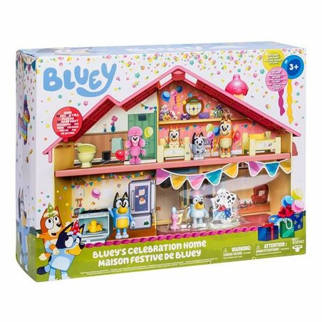 Niña jugando con la Casa de Muñecas Bluey, fomentando juego de rol