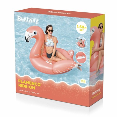 Niño jugando en figura hinchable gigante Bestway en la playa