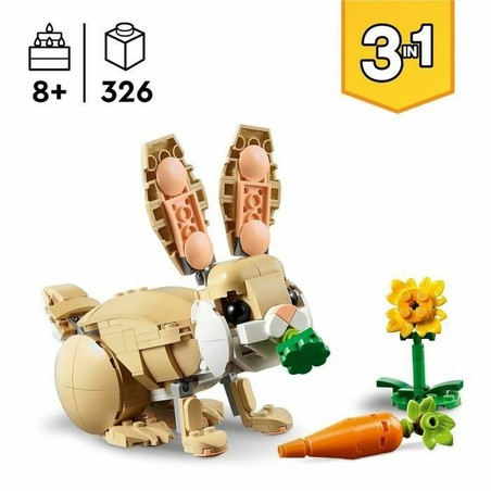 Niño construyendo con Lego, fomentando la creatividad infantil.