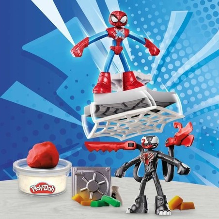 Niño jugando con figuras de Spider-Man y arcilla modelar niños