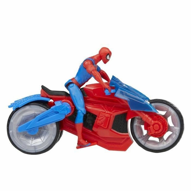 Escena de juego con playset y figura de superhéroe en acción