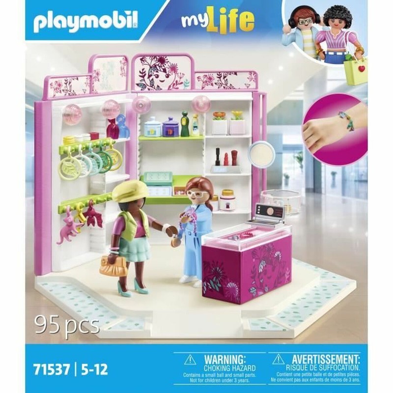 Muñecos Playmobil en tienda de juguetes, fomentando juego simbólico infantil