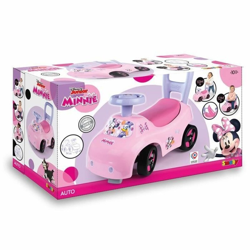 Niña jugando con correpasillos Smoby Minnie Rosa, fomentando su motricidad fina como un juguete construcción motricidad fina.