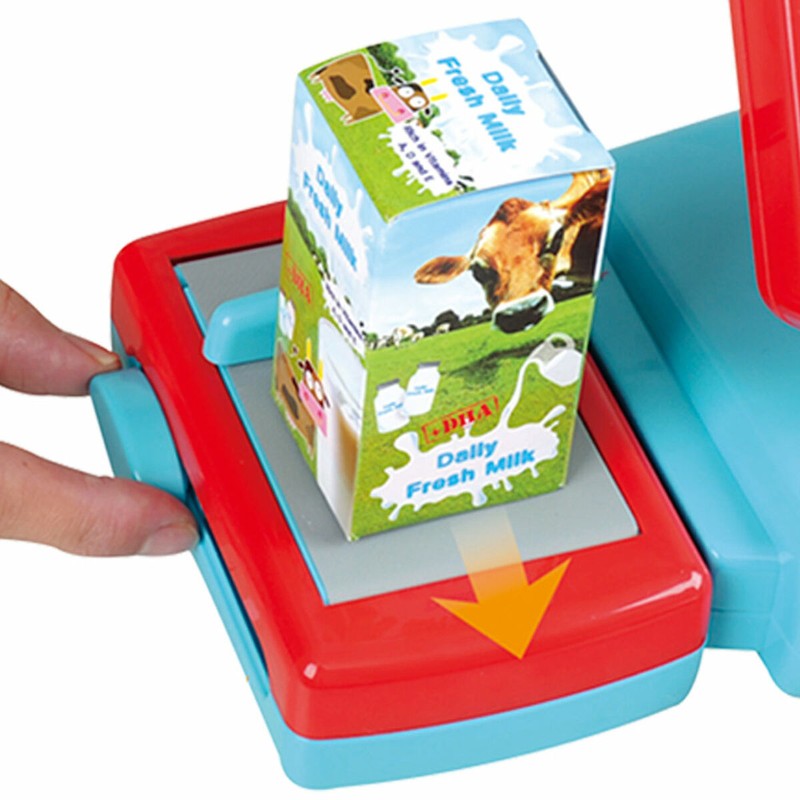 Niña jugando con caja registradora PlayGo, juguete construcción motricidad fina