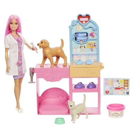 Barbie veterinaria examinando a un paciente animal