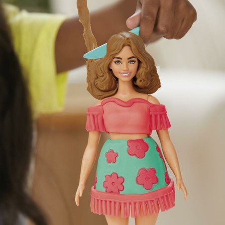 Detalle de plastilina Play-Doh de colores vibrantes y herramientas