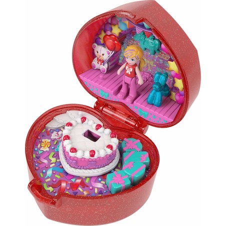 Detalle de figuras Polly Pocket y accesorios en el playset
