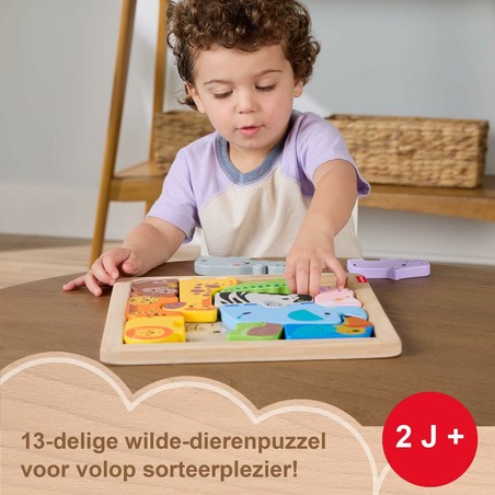 Familia jugando con puzzle Fisher-Price: Tiempo de calidad.