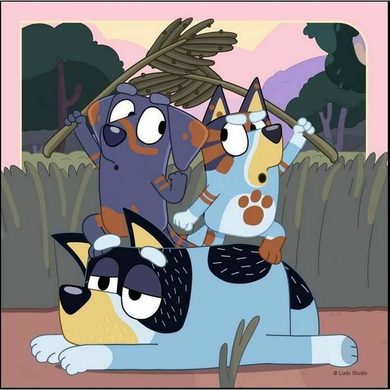 Niño resolviendo puzzle Bluey, mejora de habilidades